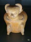 Vaso antropomorfo arancione fine 100-650 d.C.